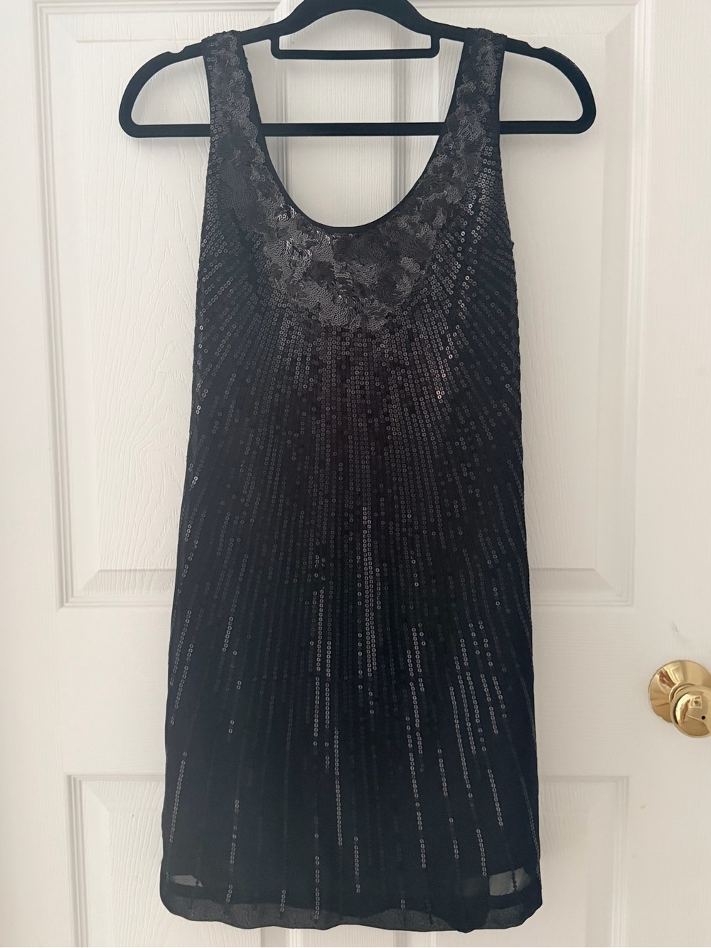 Black sequin mini dress with silver accents
- Sleek Evening Dress